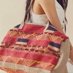 FREE PEOPLE FIRST CLASS BAG.  NEW WITH OUT TAG.